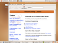 Ubuntu 7.04 (Feisty Fawn) showing help center; some of the applications that characterize Ubuntu are shown in GNOME panel.
